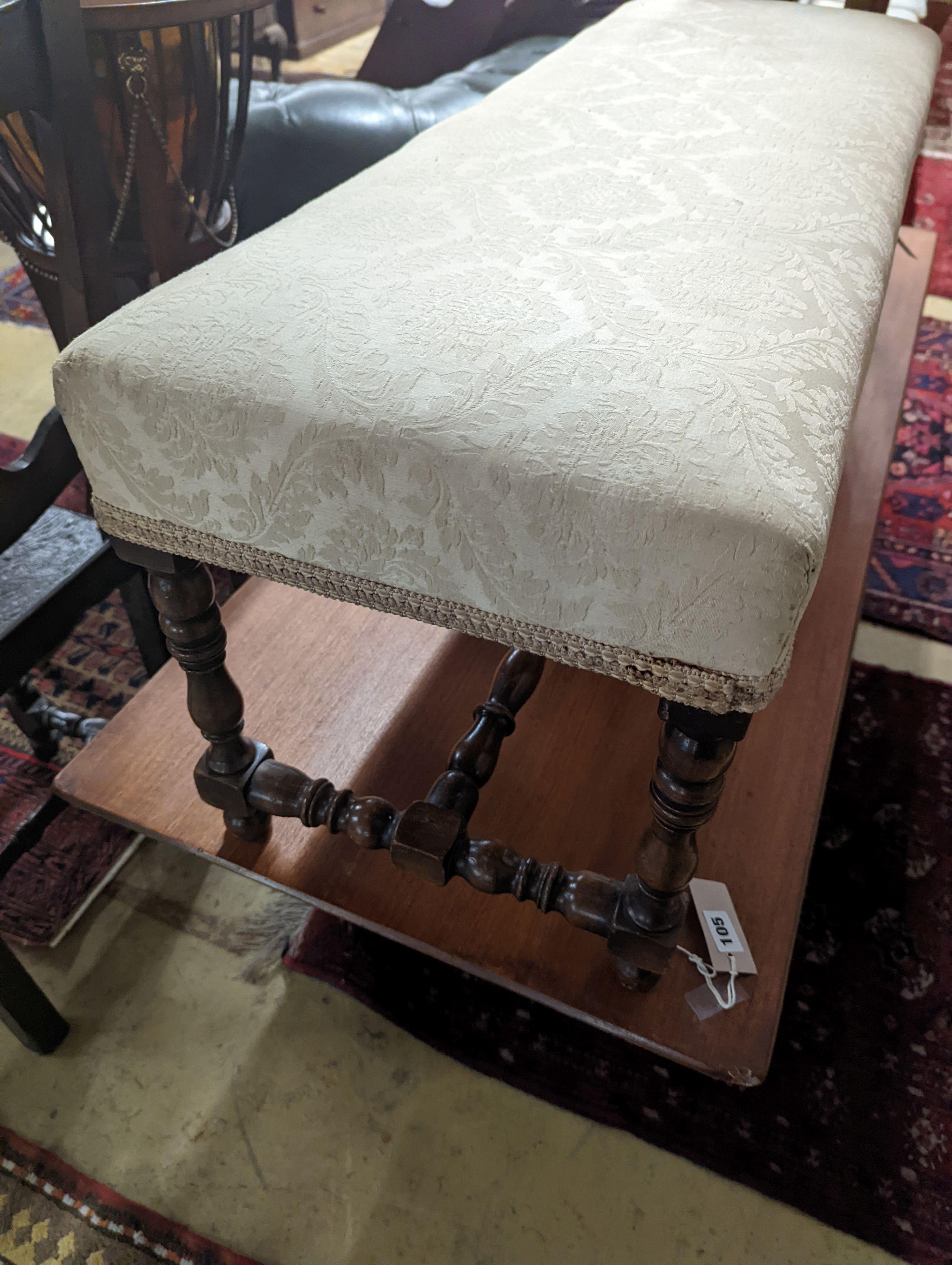 A 1920's turned mahogany window seat, length 98cm, depth 36cm, height 40cm